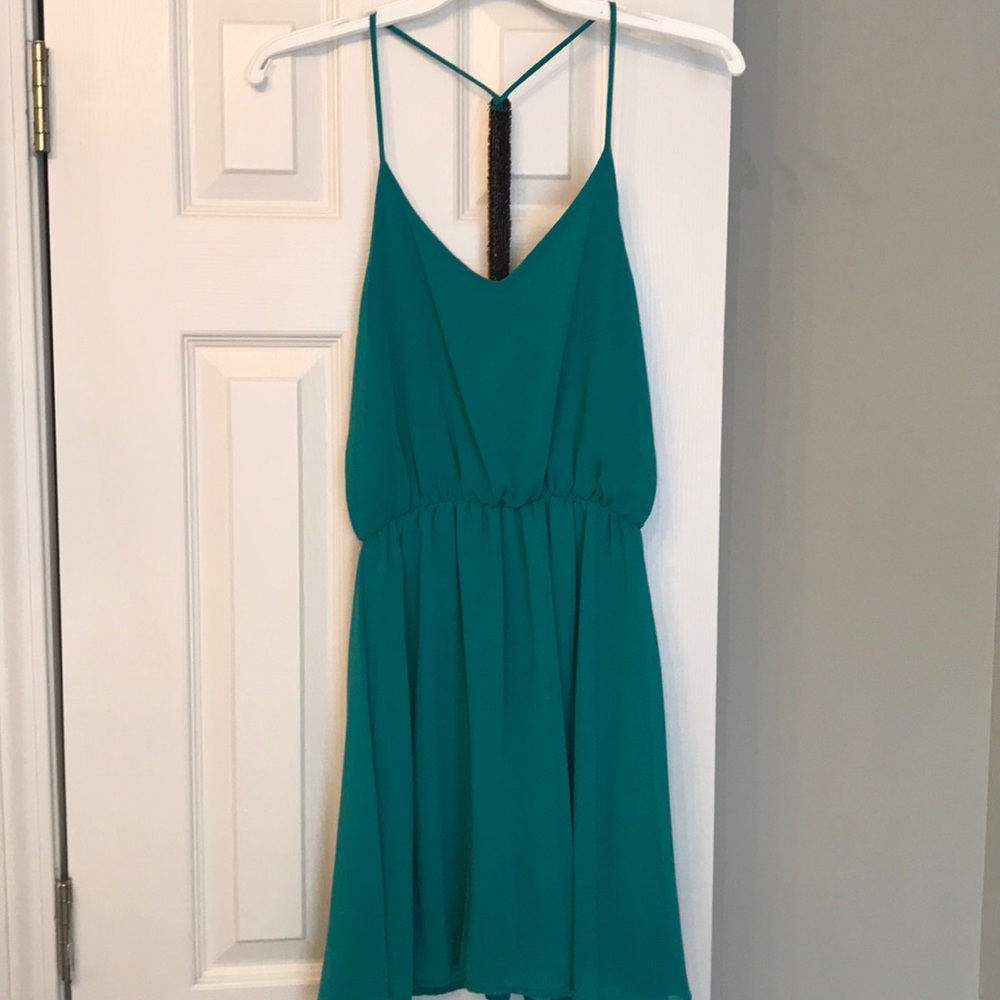 SOLD-Aqua beaded T-back dress